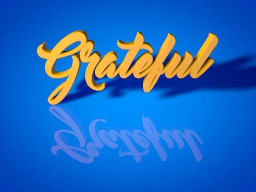3D text saying Grateful